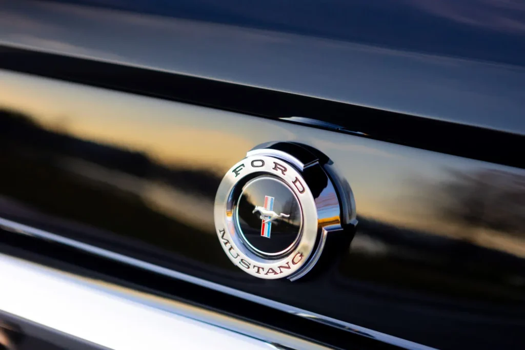 A close-up of a 1966 Mustang 2+2 Fastback back emblem