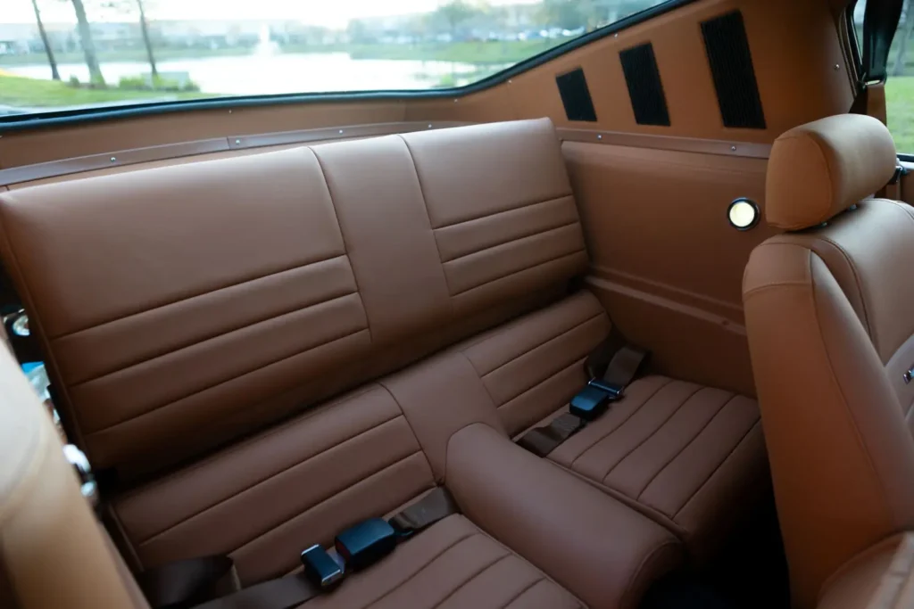 Backseat of a 1966 Mustang 2+2 Fastback with a brown interior