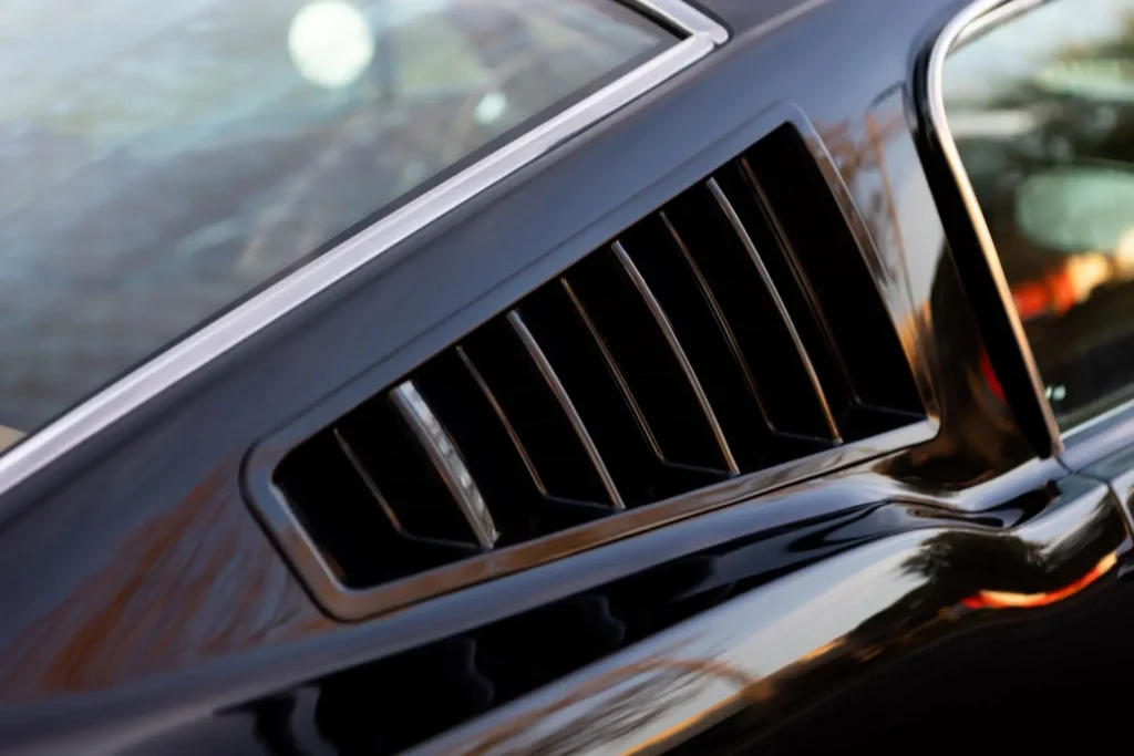 A close-up of a 1966 Mustang 2+2 Fastback Fender vents