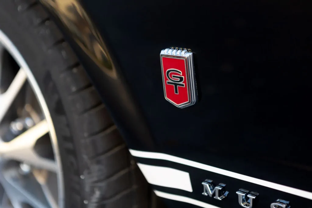 A close-up look of a 1966 Mustang 2+2 Fastback side emblem