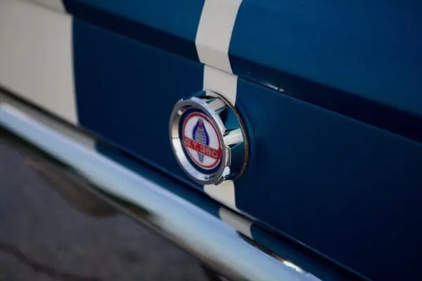 A close-up of a 1966 Shelby GT 350/ GT 350H emblem