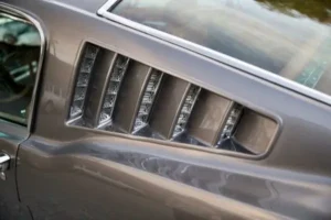 A close-up of a 1966 Mustang 2+2 Fastback Fender vents