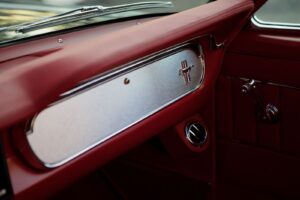 Closer look of a 1966 Mustang Convertible glove compartment.