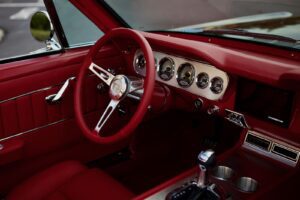 Close-up of a 1966 Mustang Convertible red interior.