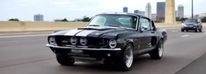 1967 Shelby GT500 classic car in black color with white stripes.