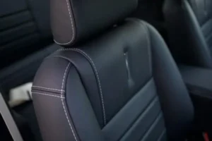 Leather front black seats with white sewing in a 1967 Shelby GT 500 interior