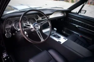 Steering wheel design in a 1967 Shelby GT 500 interior.
