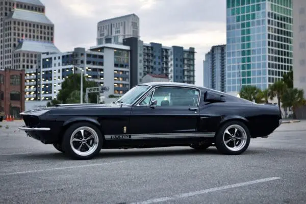 Distinctive left side external appearance of a 1967 Shelby GT 500.