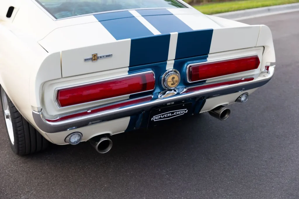 A close-up of a white 1967 Shelby GT 350 back exterior.