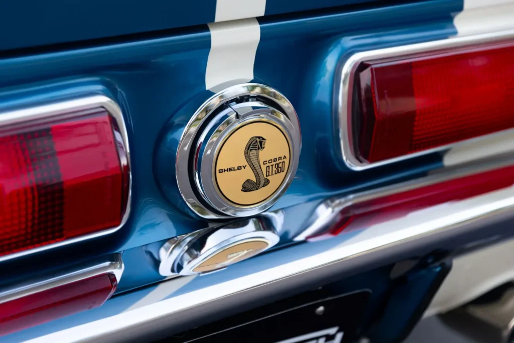 A close-up of a 1967 Shelby GT 350 trunk emblem