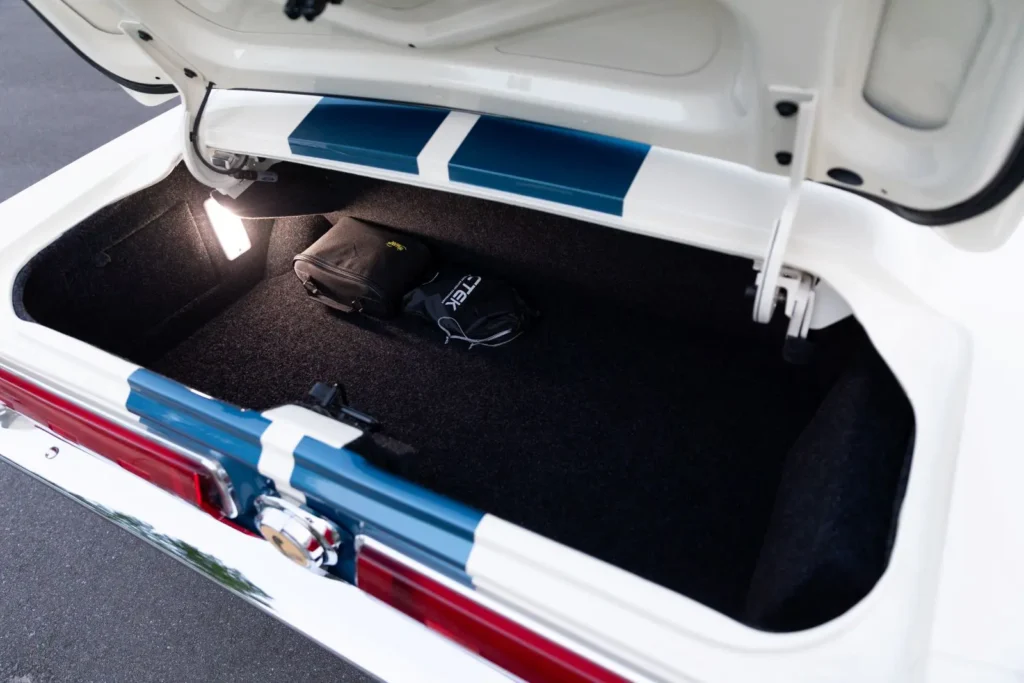 Open trunk of a white 1967 Shelby GT 350.