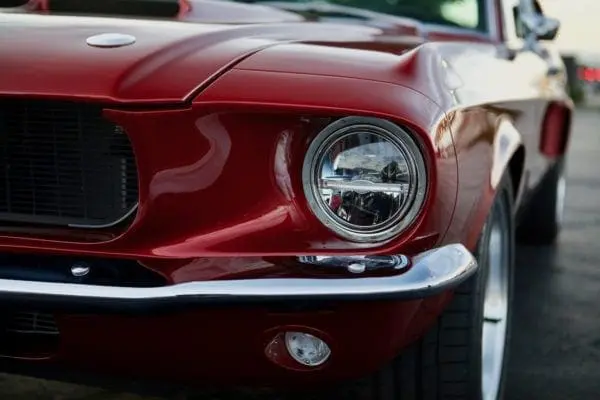 The front left headlight of a 1967 Shelby GT 350