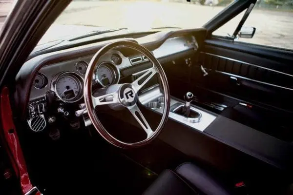 Close-up of a 1967 Shelby GT 350 steering wheel design.