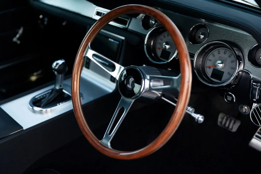 Close-up of a 1967 Shelby GT 350 steering wheel design.