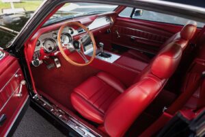 Side view to 1967 Mustang GT / GTA 2+2 Fastback red interior