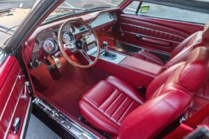 Upper view of a 1967 Mustang GT / GTA 2+2 Fastback red interior.