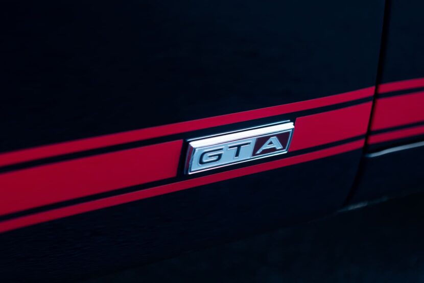 A close-up look of a black 1967 Mustang GT / GTA 2+2 Fastback letter emblem.