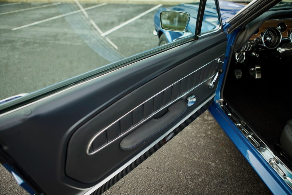 Left door interior cut, sewn, and fitted by hand leather in a 1968 Mustang GT 2+2 Fastback Cobra Jet