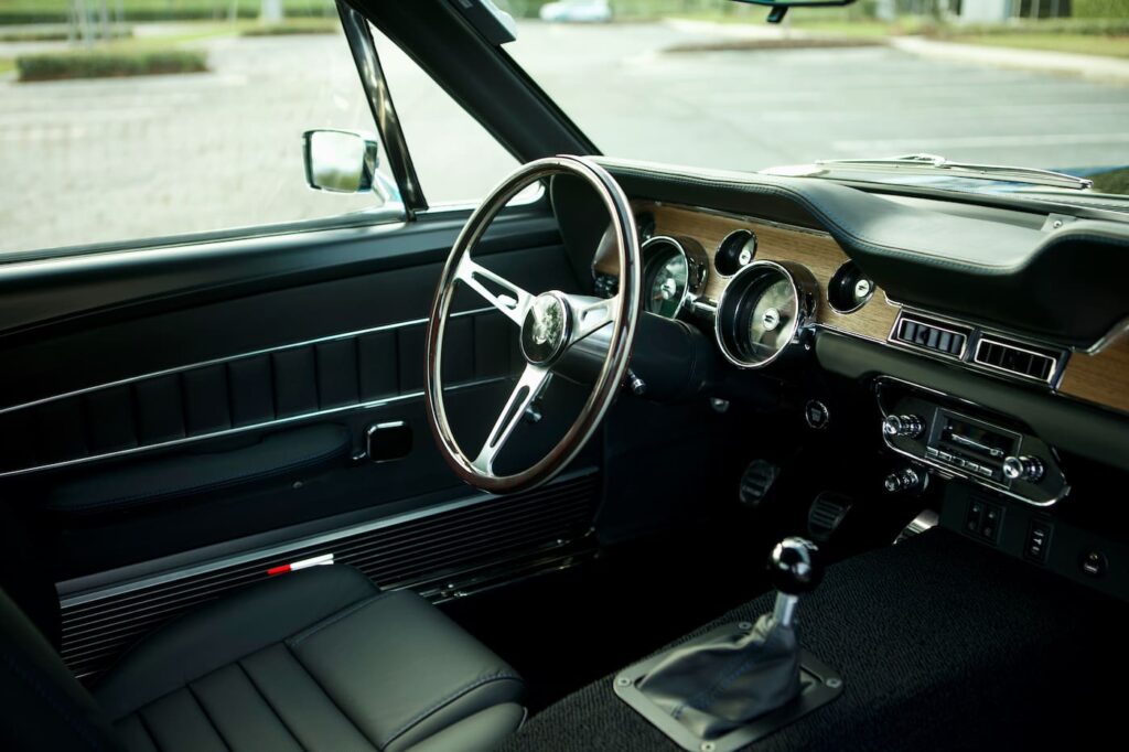 Left view close up of a 1968 Mustang GT 2+2 Fastback Cobra Jet steering wheel.