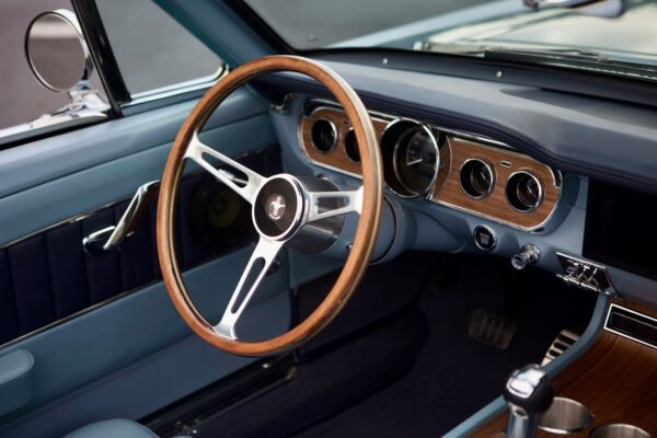 Steering wheel of a vintage 1966 Mustang Convertible.