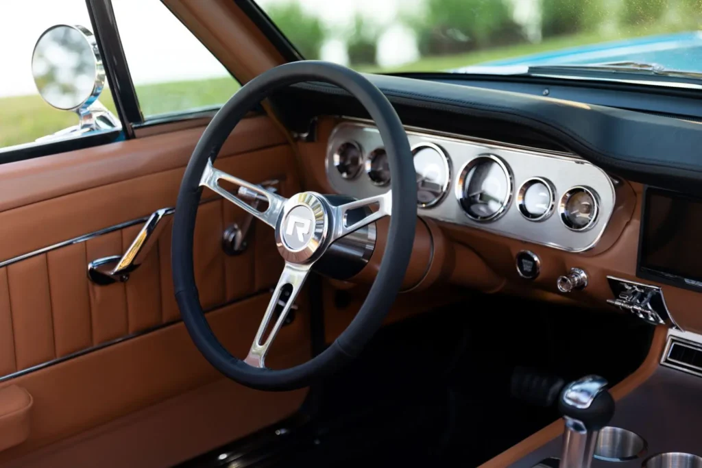 Steering wheel and dashboard of a 1966 Mustang Convertible.