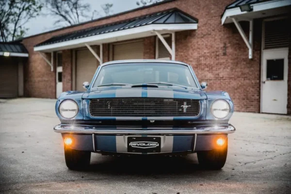 The front headlights of a 1966 Shelby GT 350/ GT 350H.