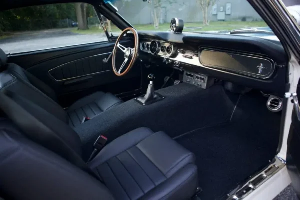 1966 Shelby GT 350/ GT350H interior design with right door open point of view.