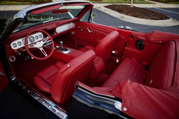 Red leather interior in a 1966 Mustang Convertible.