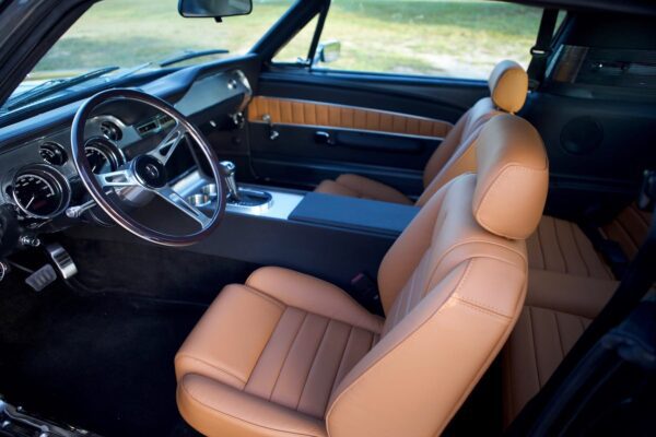 Brown interior of a 1967 Mustang GT / GTA 2+2 Fastback shot from the driver side.