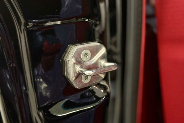 A close-up to the 1967 Mustang GT / GTA 2+2 Fastback modern door hinges.
