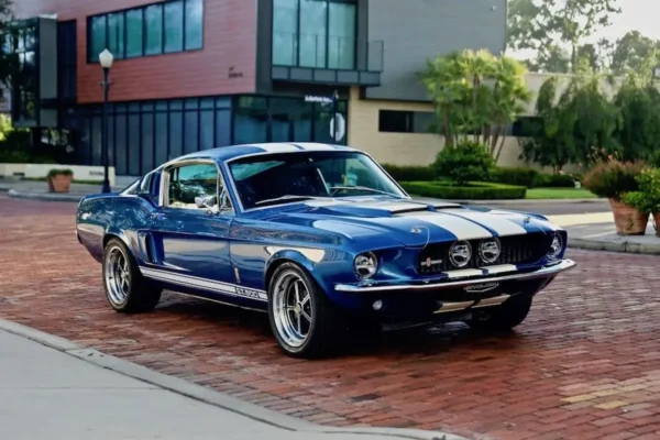 Blue with white stripes 1967 Shelby GT 500 side view with exceptional fit and flushness.