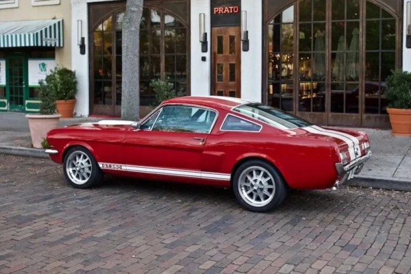 Red 1966 Shelby GT 350/ GT 350H parked.