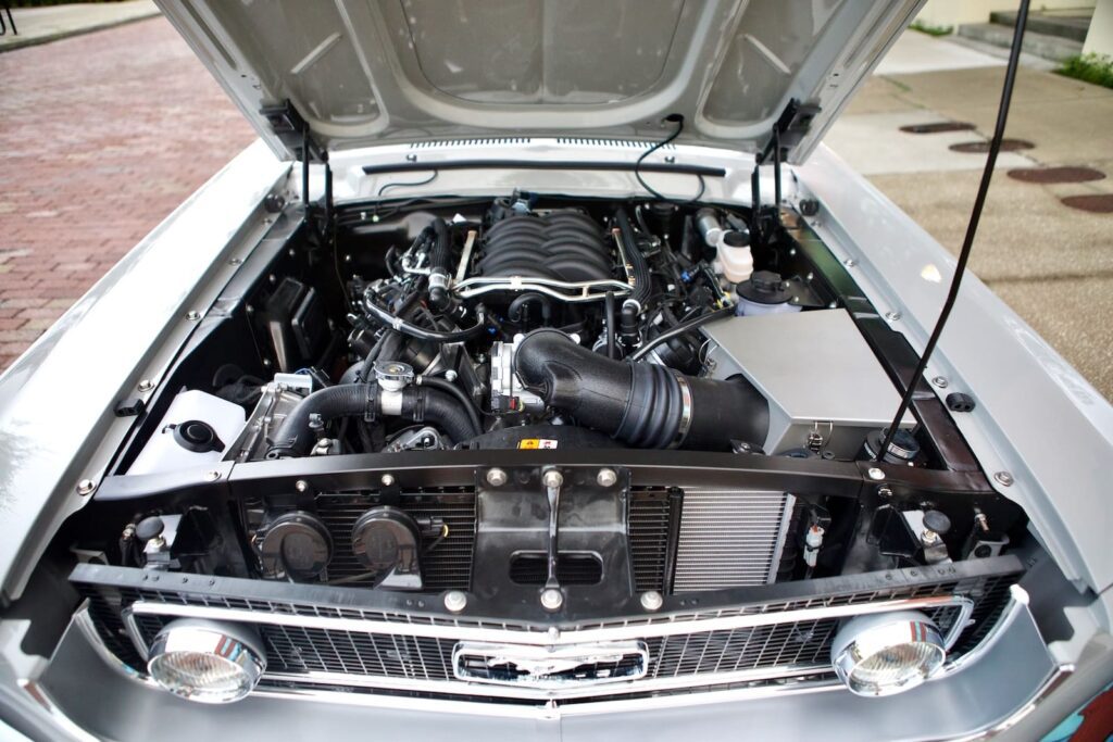 A closer look of a gray 1967 Mustang GT / GTA 2+2 Fastback engine.